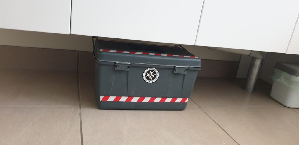 first aid box under cupboard